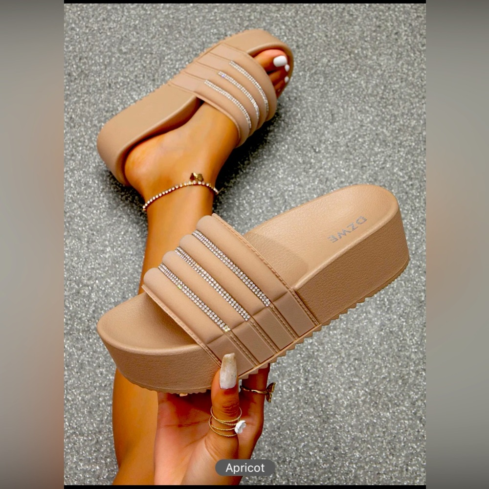 Woman. Summer slippers.